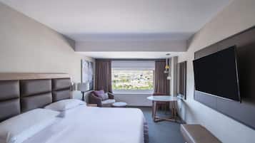 Deluxe-huone | Untuvapeitot, pillowtop-patjalliset sängyt, minibaari