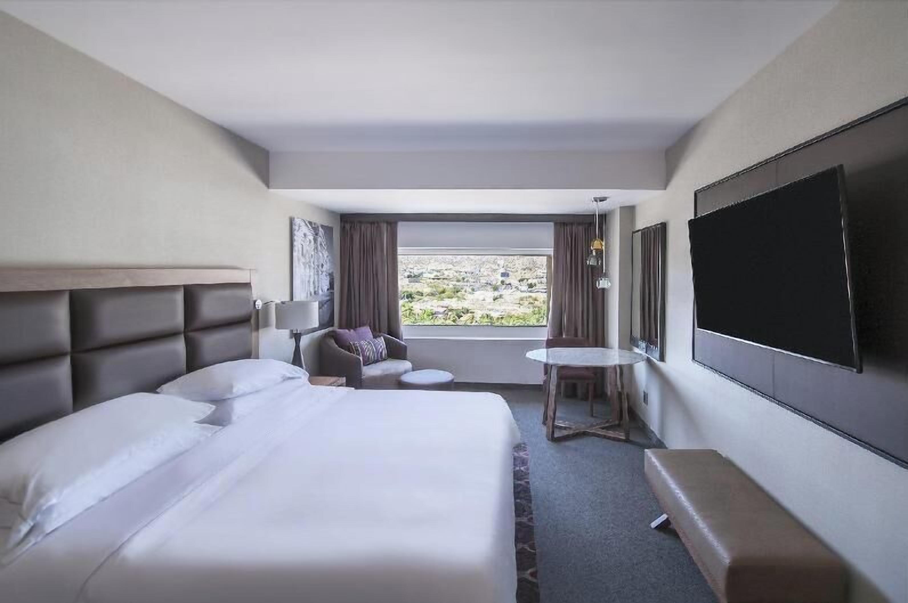 Down duvets, pillow-top beds, minibar, in-room safe