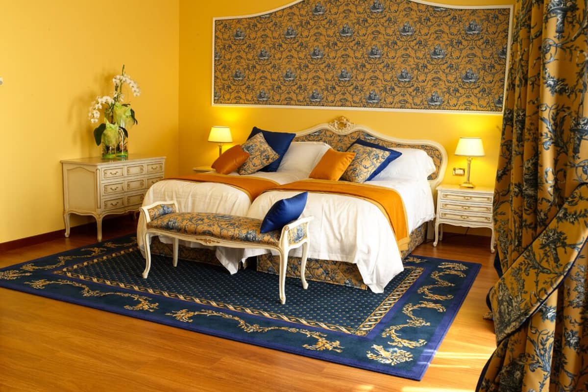 deluxe room | minibar, in-room safe, desk, blackout curtains