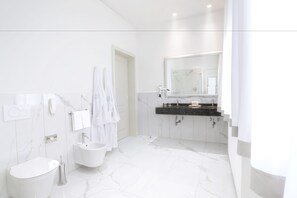 Senior Suite | Bathroom | Combined shower/bathtub, hair dryer, dressing gowns, bidet