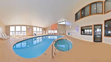 Indoor pool, open 8 AM to 11 PM, pool loungers