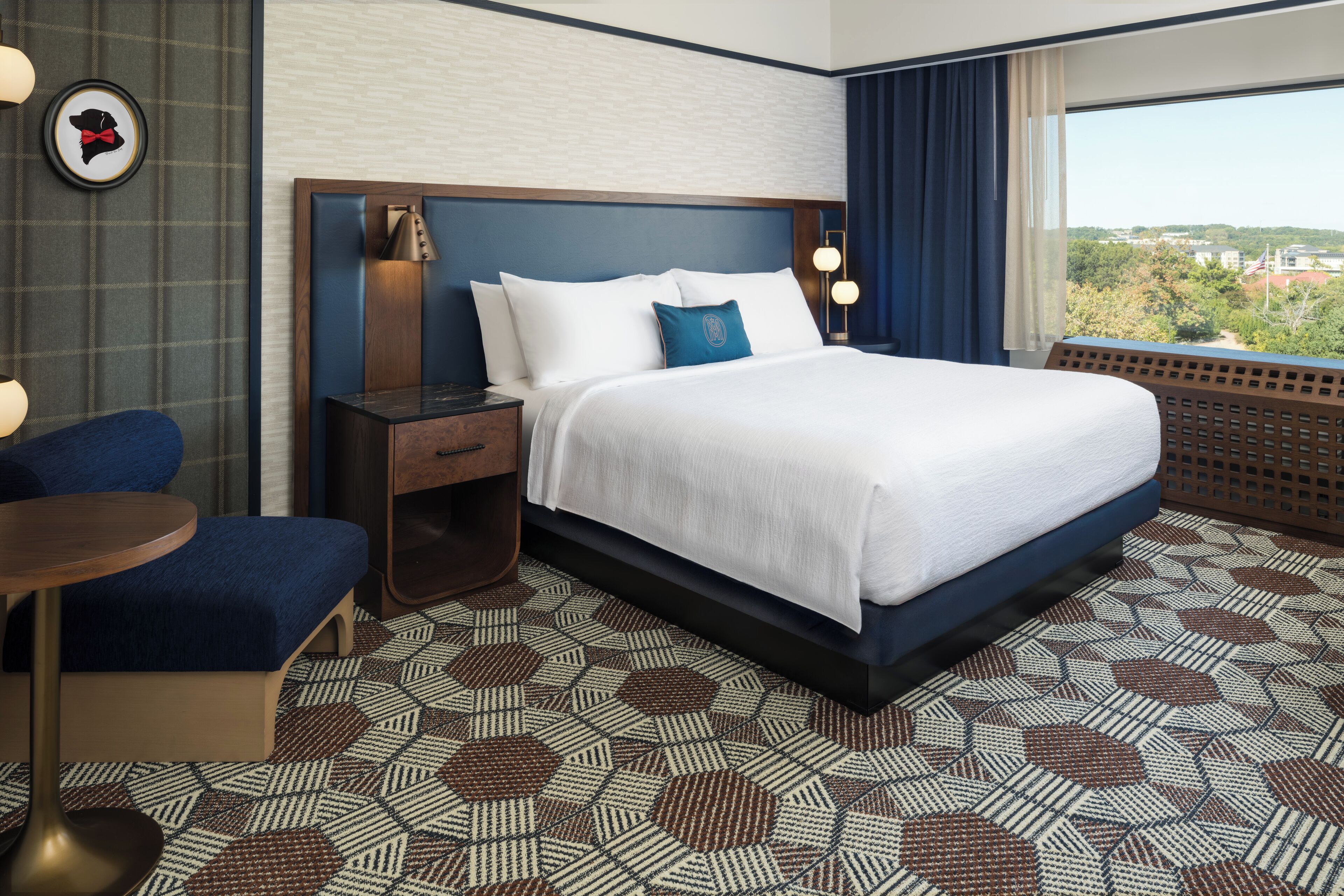 Premium bedding, desk, laptop workspace, iron/ironing board