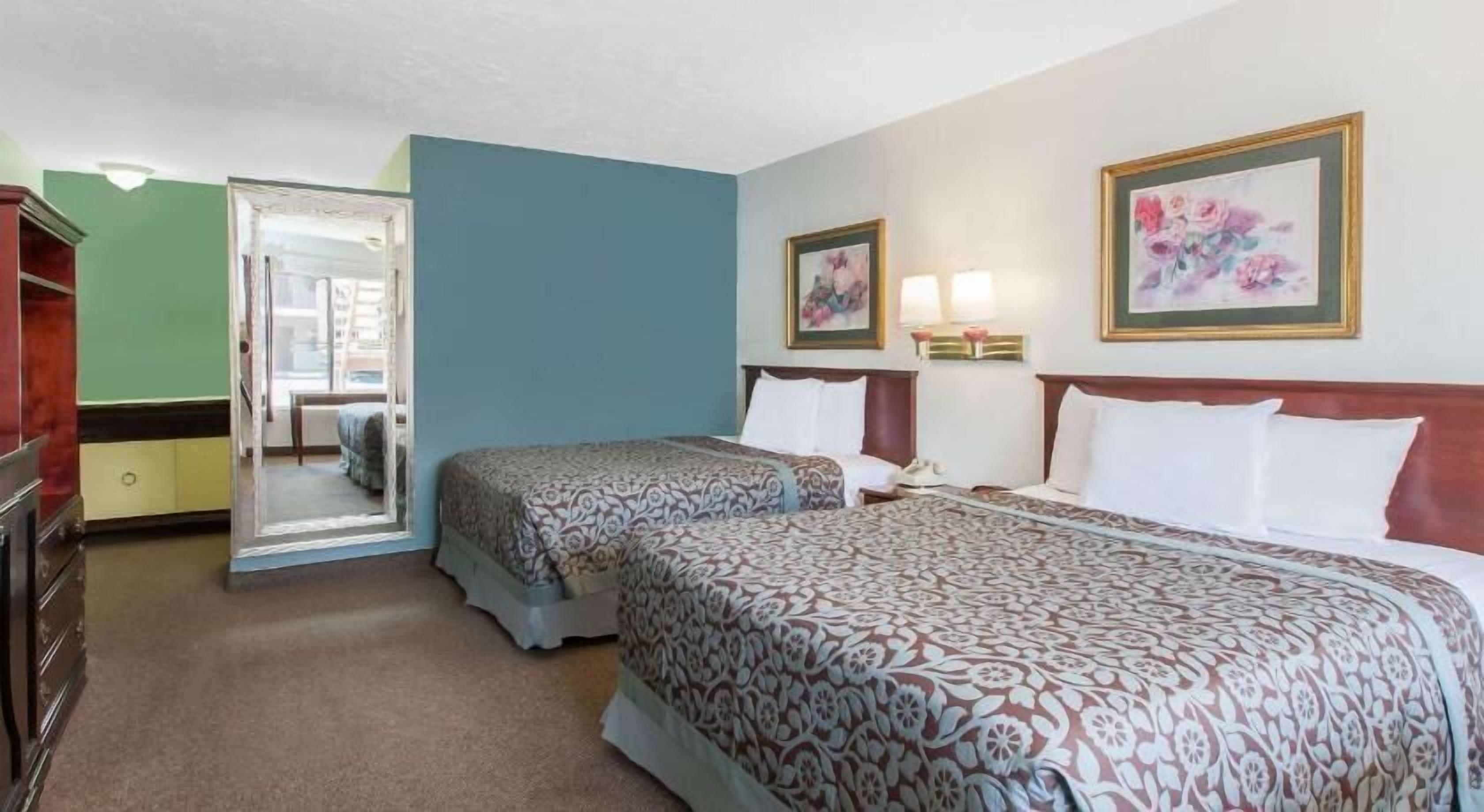 Desk, laptop workspace, blackout curtains, free cots/infant beds
