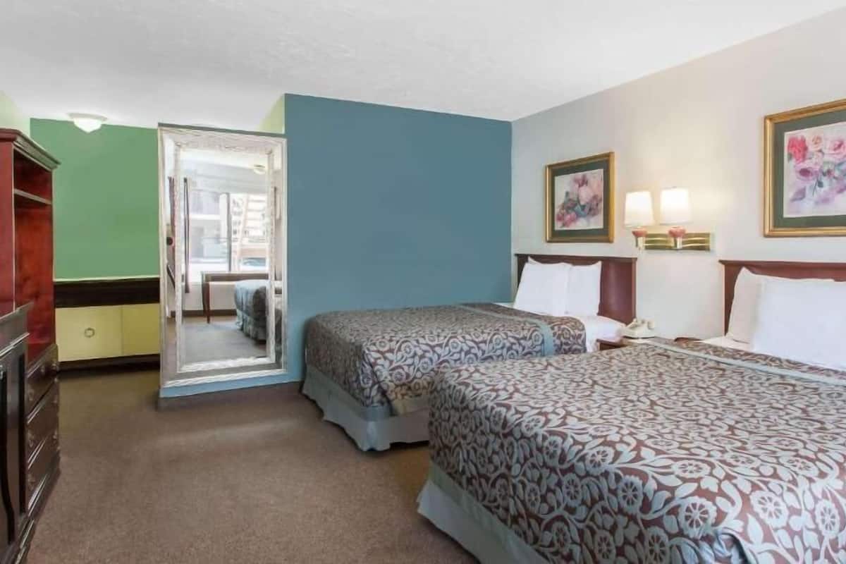 Desk, laptop workspace, blackout curtains, free cots/infant beds