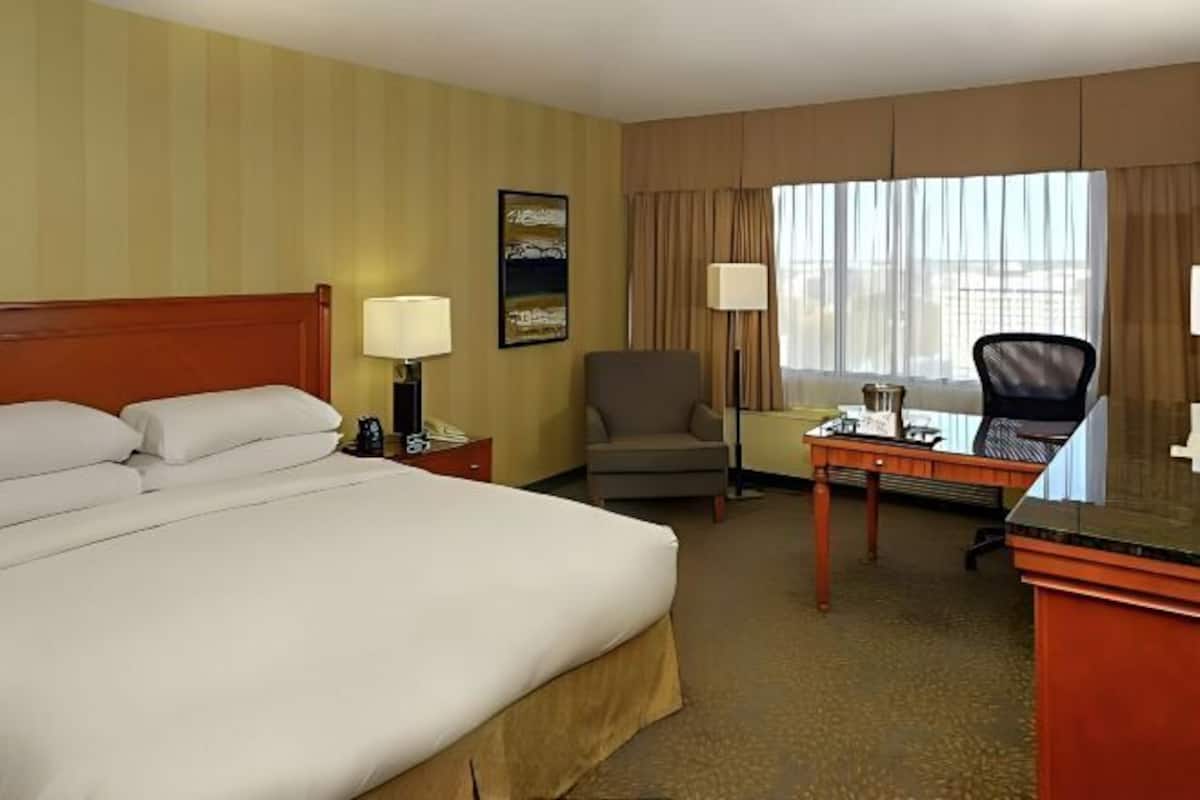 Premium bedding, down duvets, pillow-top beds, in-room safe