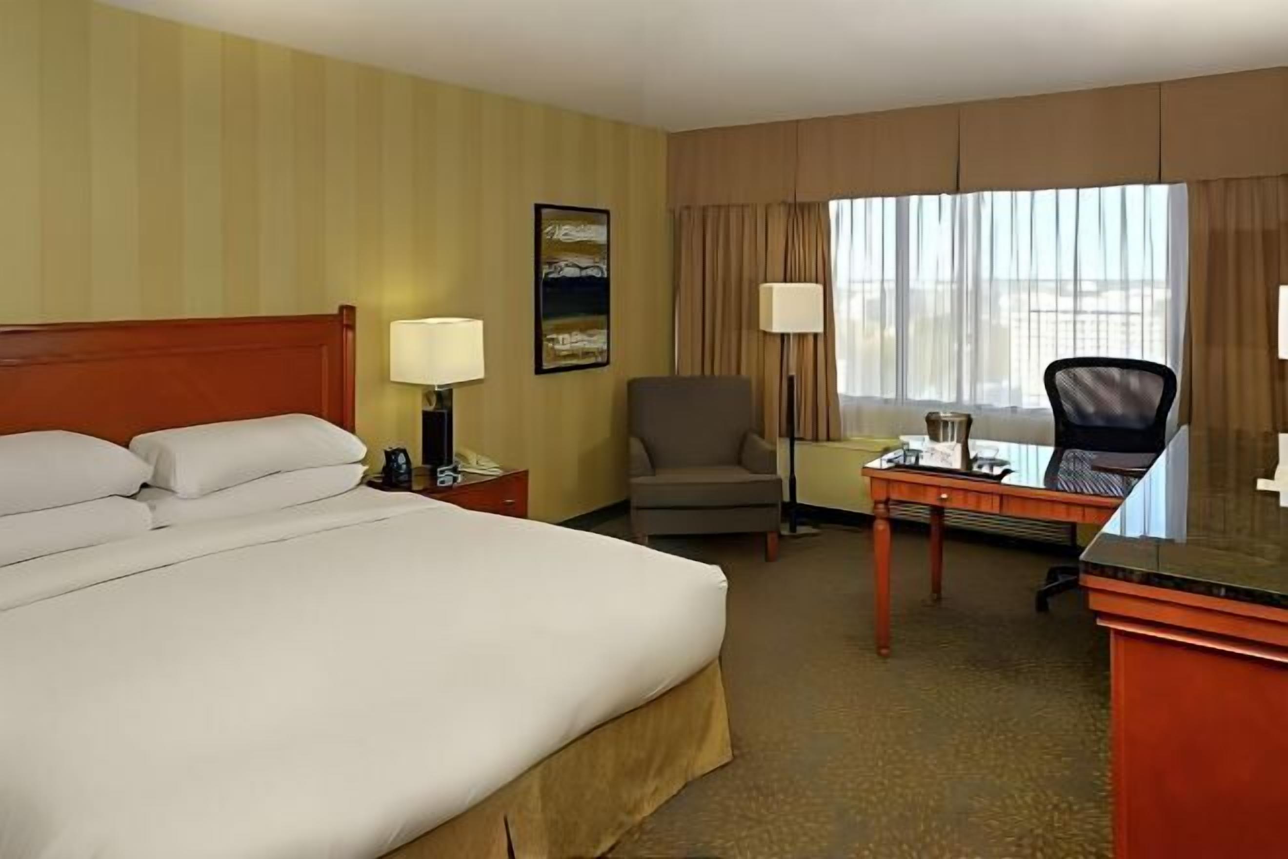 Premium bedding, down comforters, pillowtop beds, in-room safe