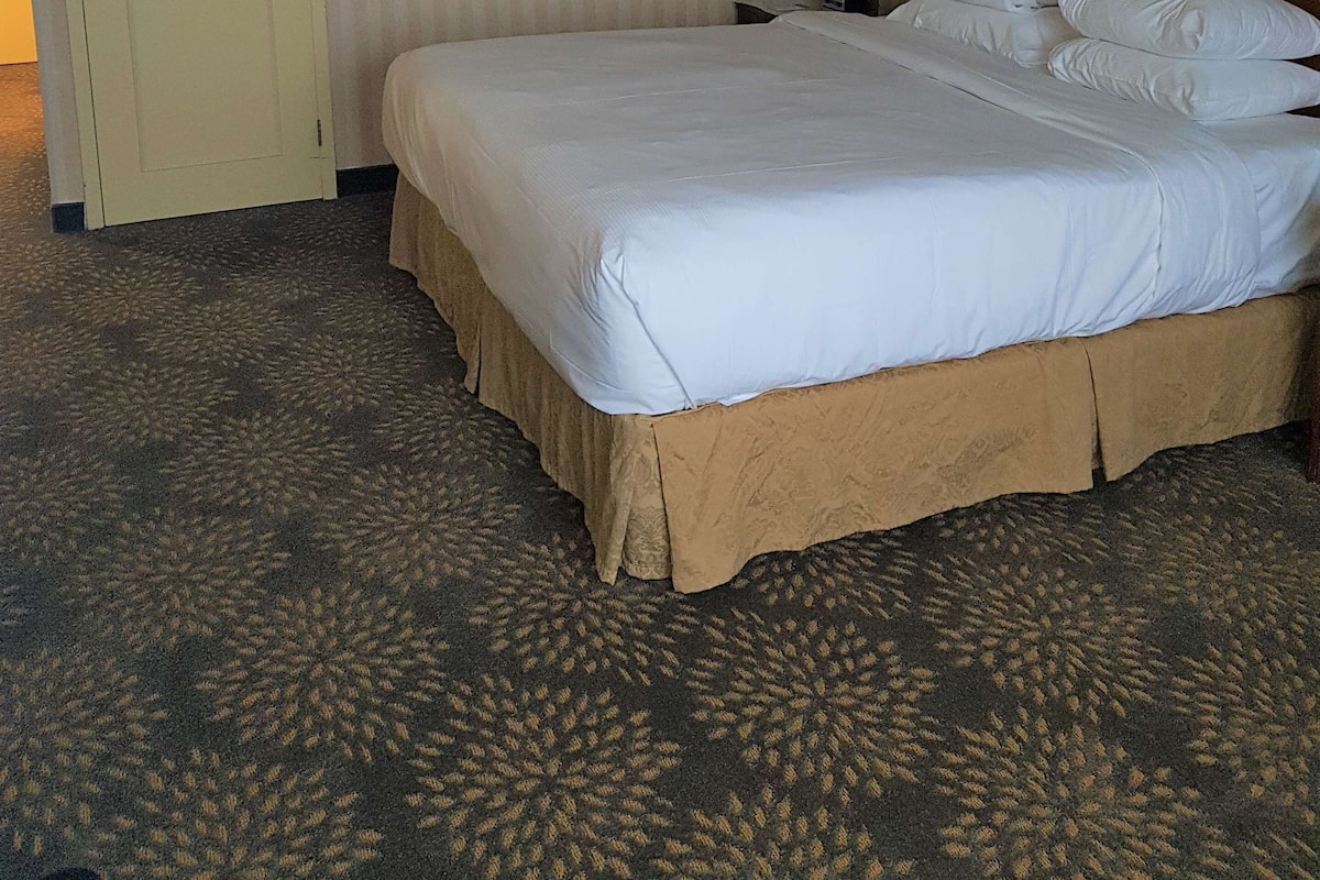 Premium bedding, down duvets, pillow-top beds, in-room safe