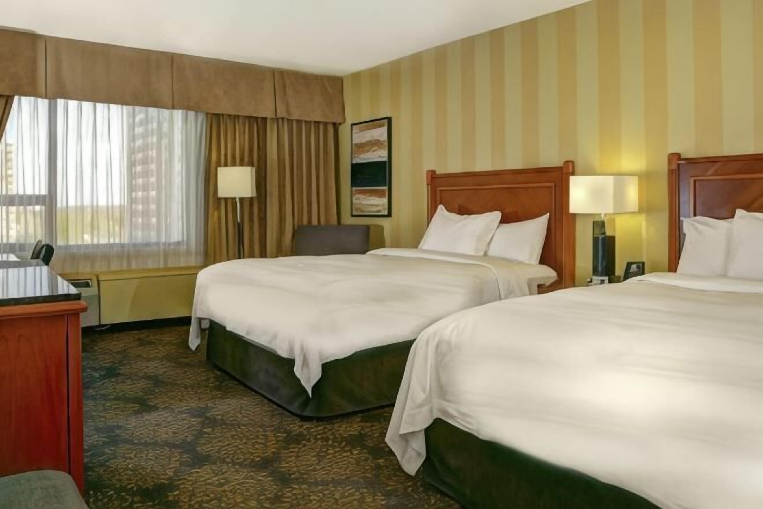 Premium bedding, down duvets, pillow-top beds, in-room safe