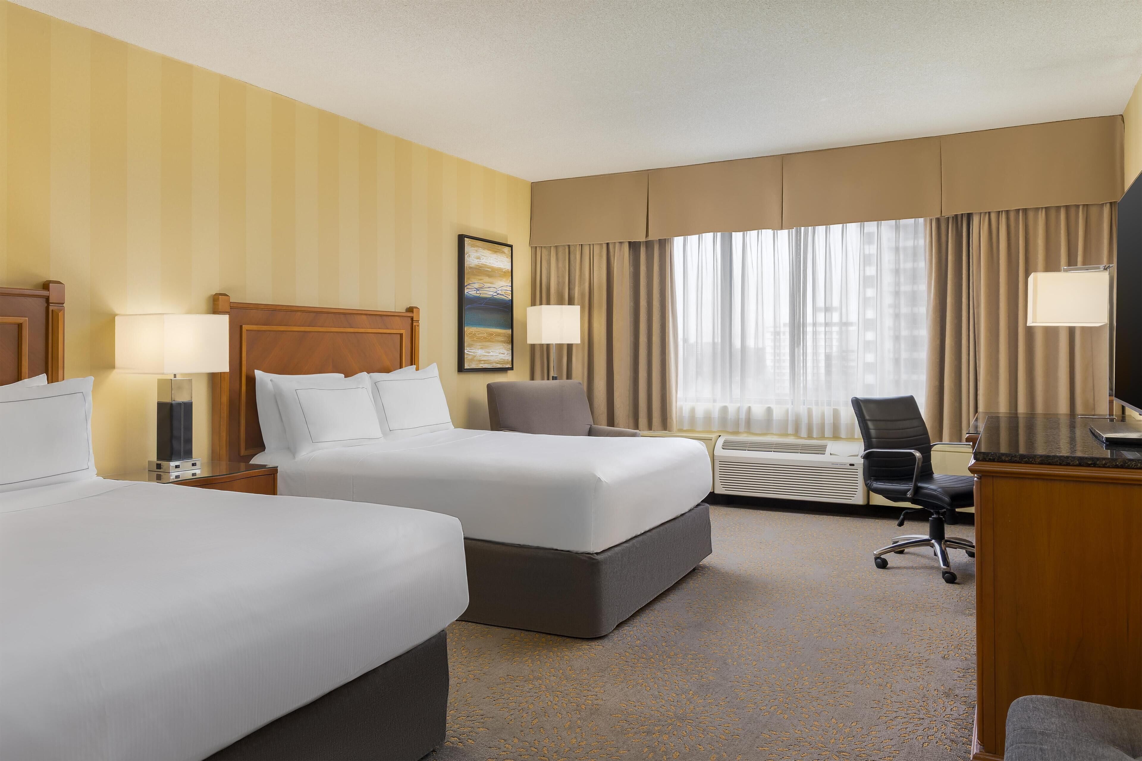 Premium bedding, down duvets, pillow-top beds, in-room safe