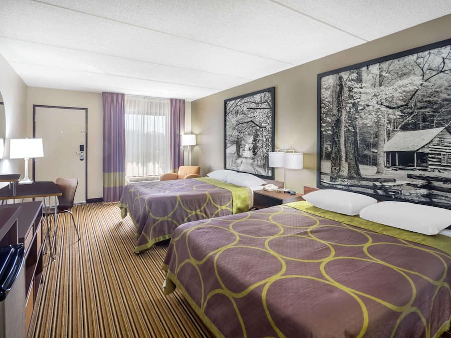 Cortinas blackout, ferros/tábuas de passar roupa, berços grátis