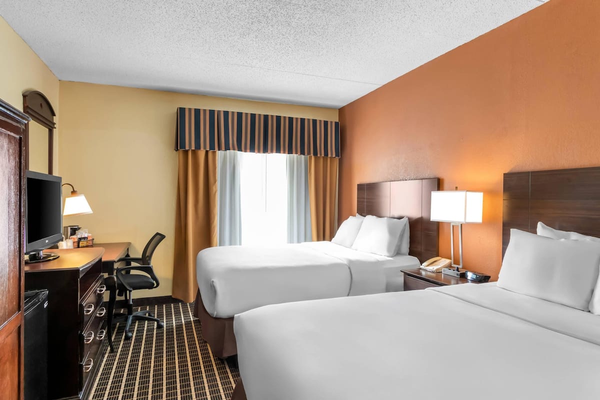 Premium bedding, down comforters, desk, blackout drapes