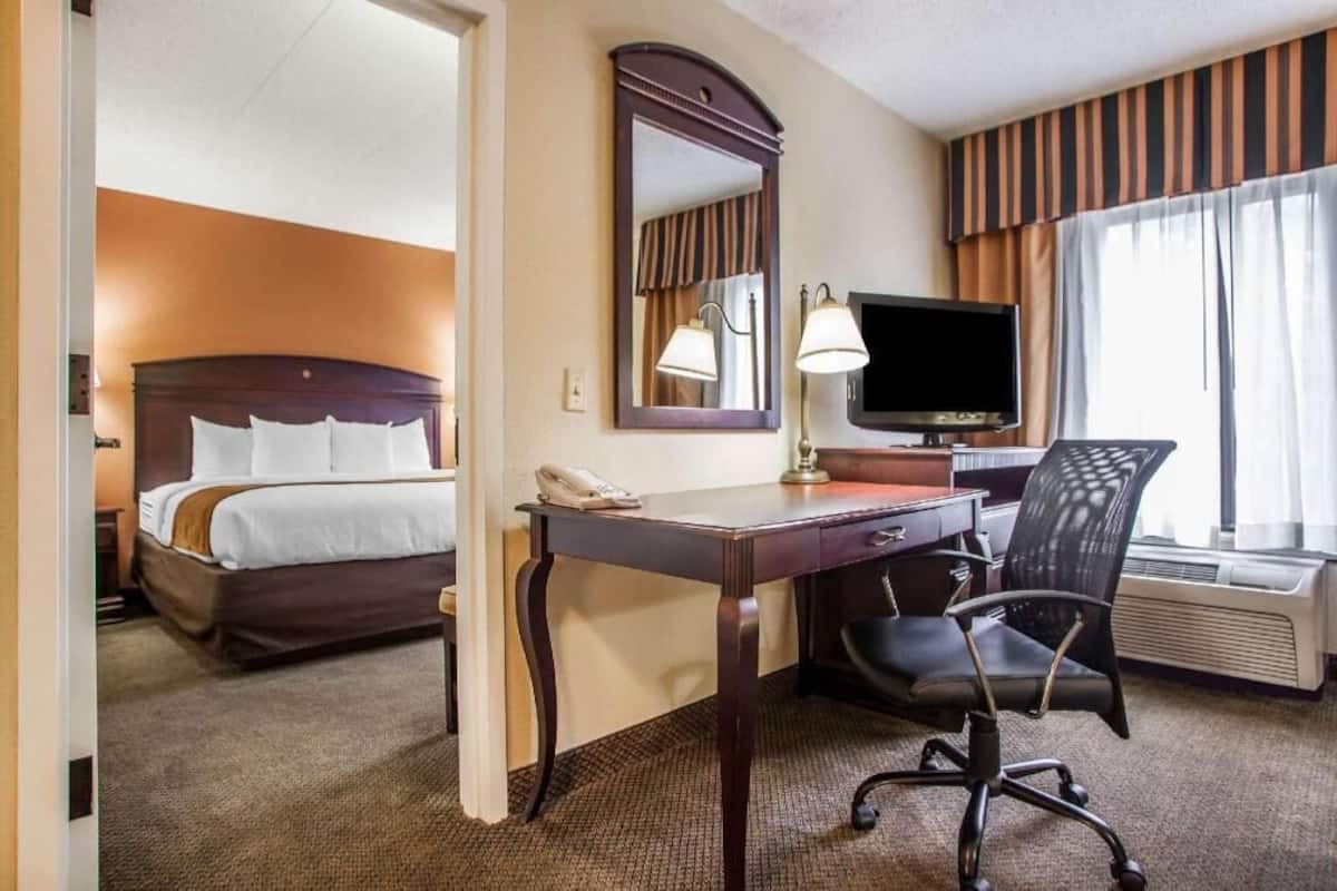 Premium bedding, down comforters, desk, laptop workspace
