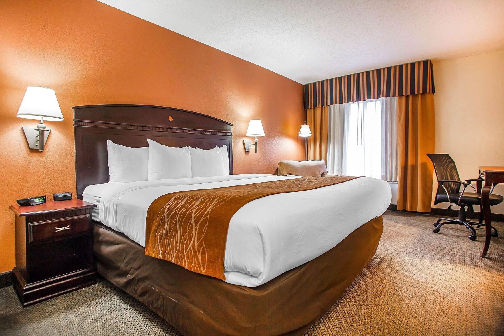 Premium bedding, down comforters, desk, laptop workspace
