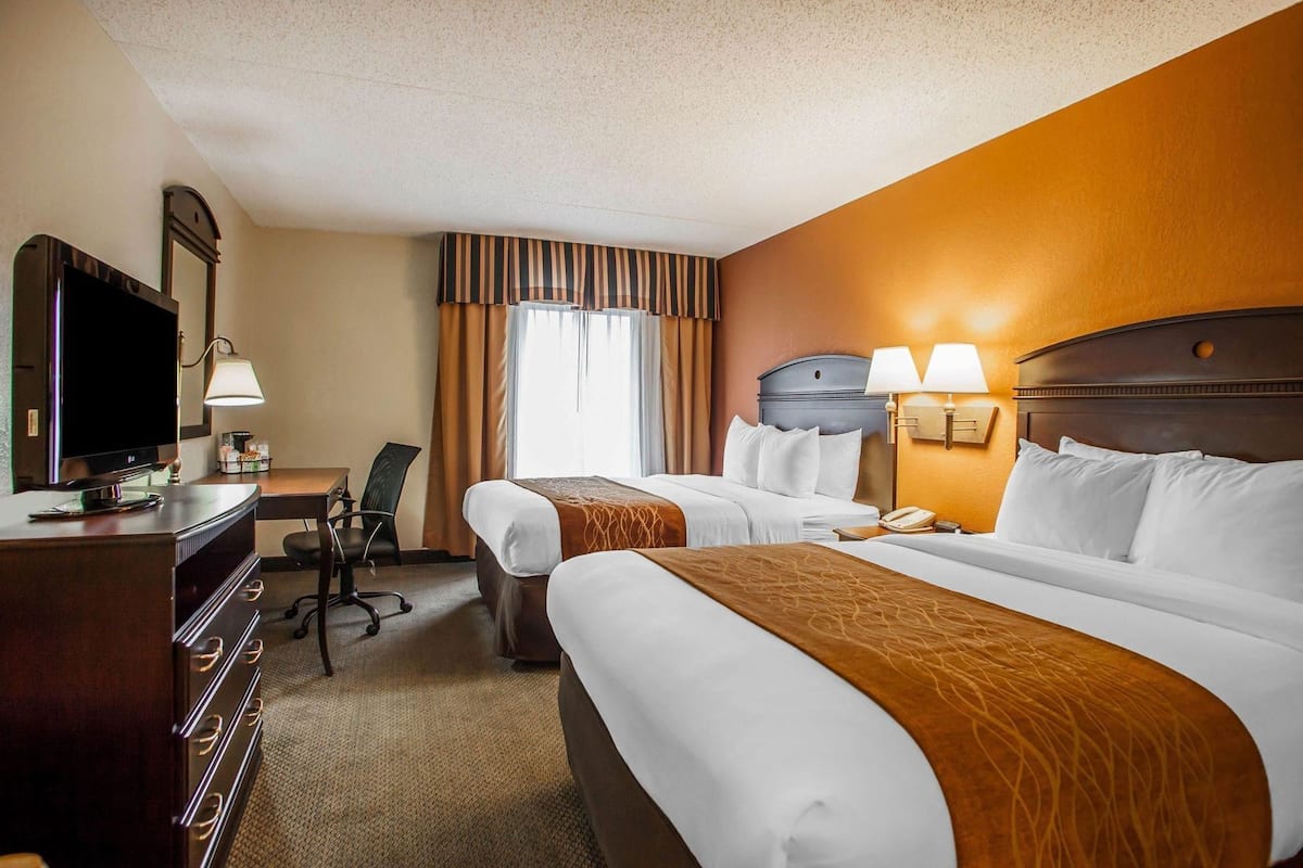 Premium bedding, down comforters, desk, laptop workspace