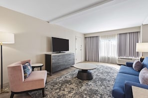 Suite, 1 King Bed, Non Smoking | Living area | 55-inch Smart TV with cable channels, Netflix, Hulu