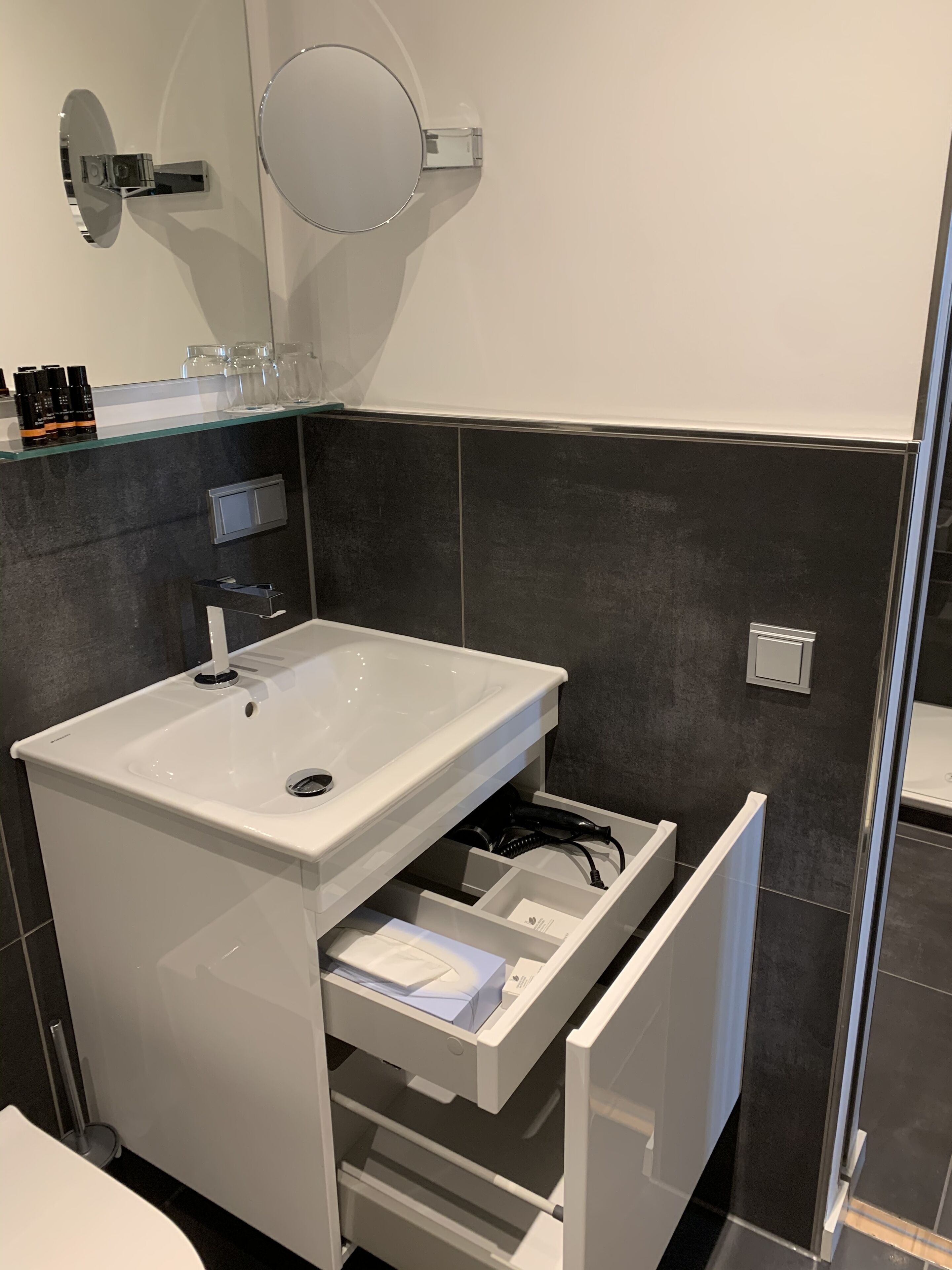 classic single room plus | bathroom | free toiletries, hair dryer, slippers, towels