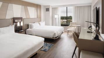 Ropa de cama de alta calidad y caja de seguridad en la habitación