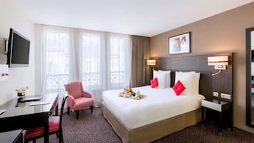 Premium bedding, pillow-top beds, minibar, in-room safe