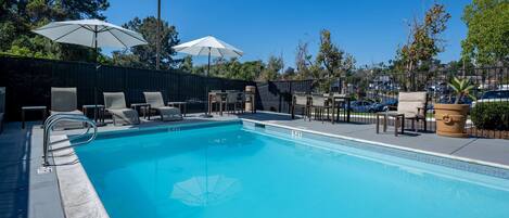 Outdoor pool, open 9:00 AM to 10:00 PM, pool umbrellas, sun loungers
