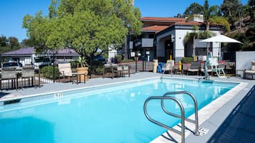 Outdoor pool, open 9:00 AM to 10:00 PM, pool umbrellas, sun loungers