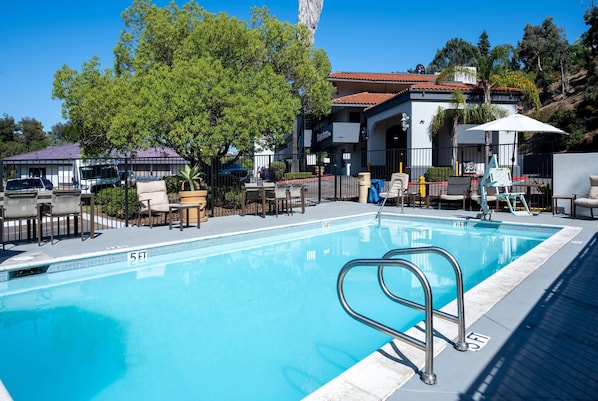 Outdoor pool, open 9:00 AM to 10:00 PM, pool umbrellas, pool loungers