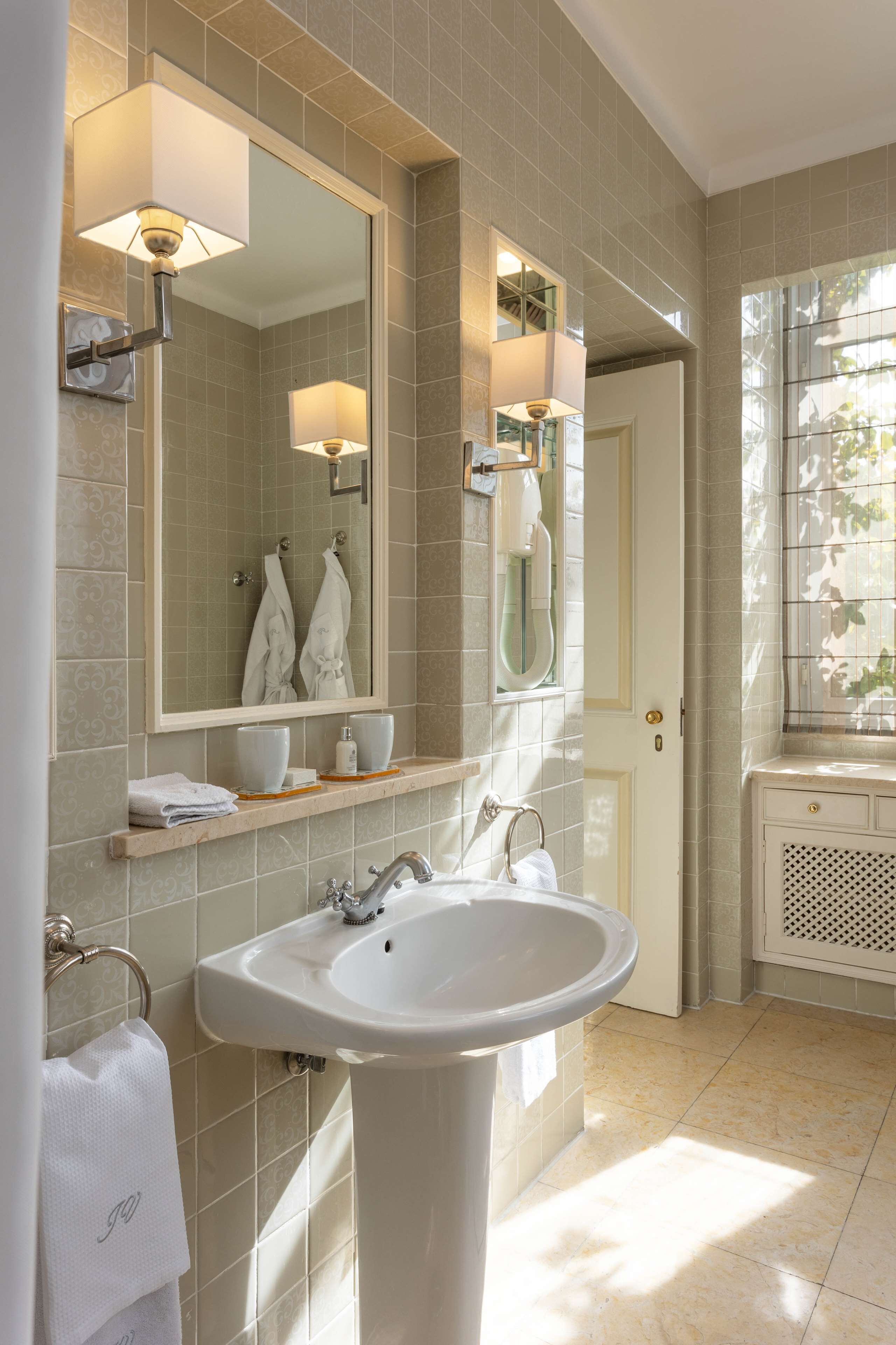 superior double room | bathroom | shower, eco-friendly toiletries, hair dryer, bathrobes