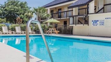 Seasonal outdoor pool, open 10:00 AM to 8:00 PM, pool loungers