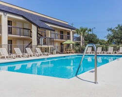 Seasonal outdoor pool, open 10:00 AM to 10:00 PM, sun loungers