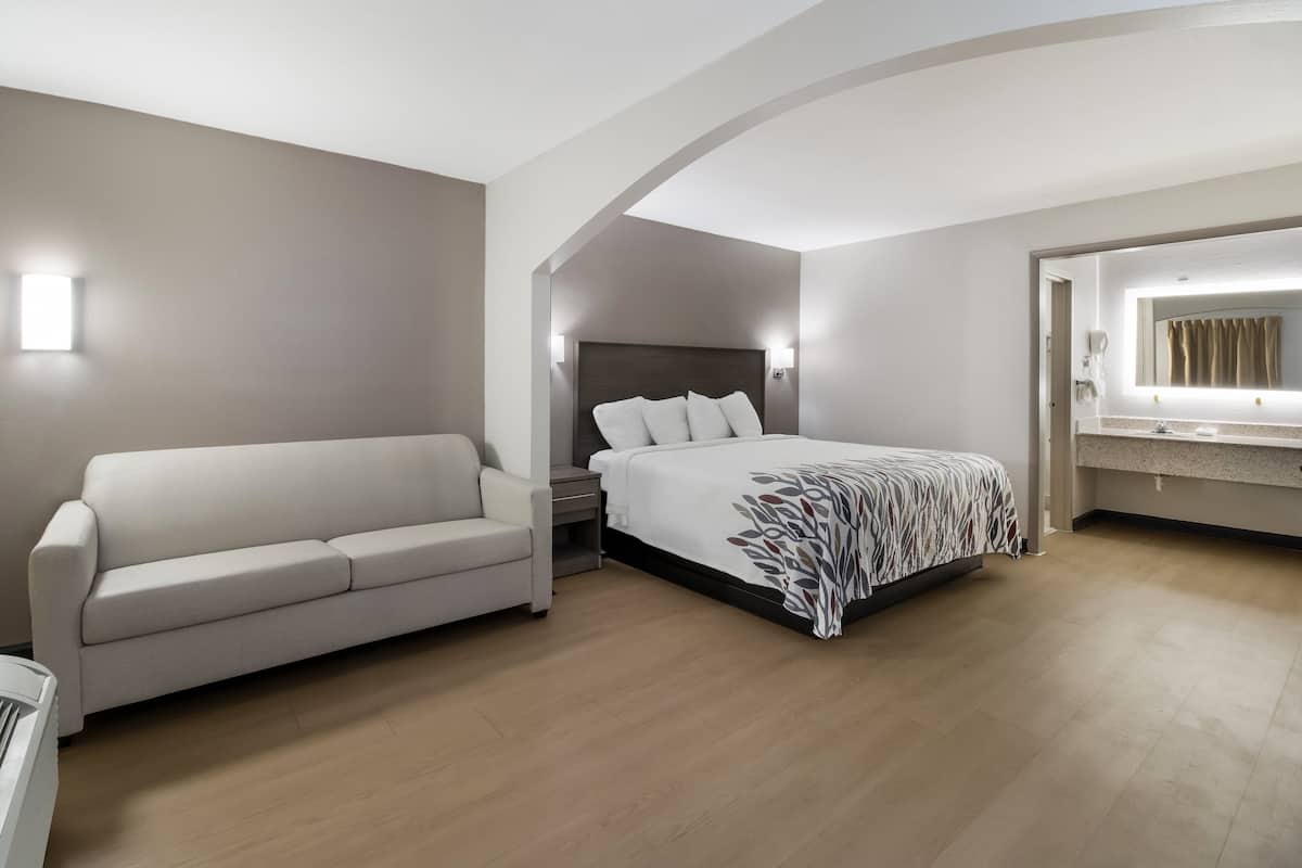 Suite, 1 King Bed, Non Smoking | Desk, iron/ironing board, free cribs/infant beds, rollaway beds