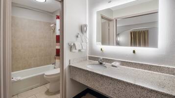 Deluxe Room, 2 Queen Beds, Non Smoking | Bathroom | Combined shower/bathtub, free toiletries, hair dryer, towels