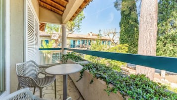 Family Quadruple Room, Multiple Beds | Terrace/patio