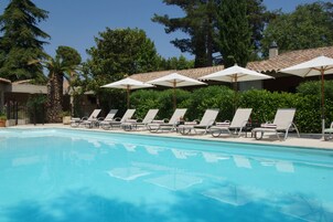 Outdoor pool, pool umbrellas, sun loungers