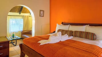 Family Room | Blackout drapes, iron/ironing board, bed sheets, alarm clocks