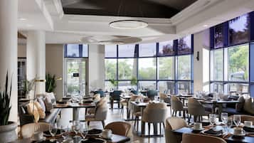 Daily buffet breakfast (USD 21 per person)