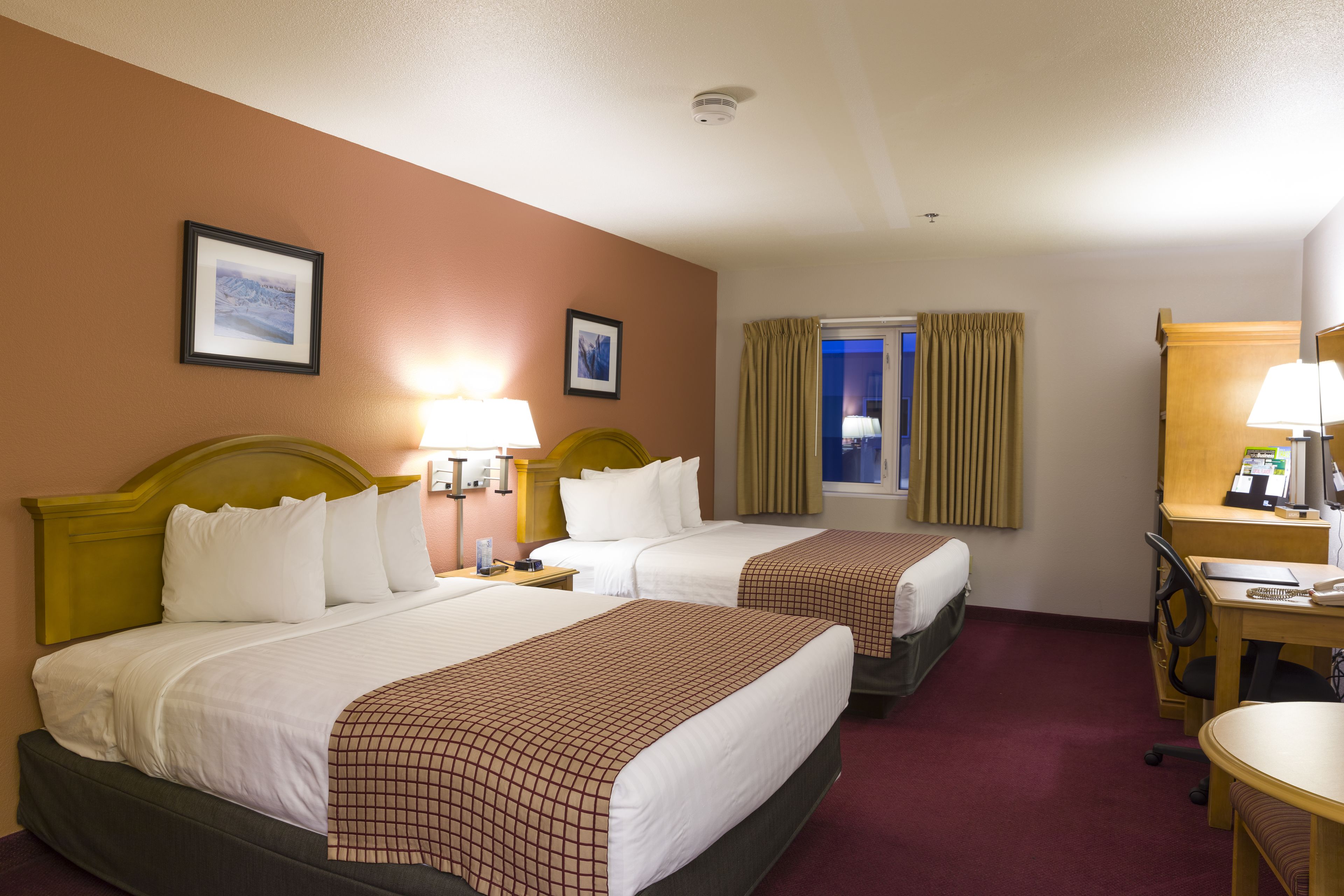 Desk, blackout drapes, iron/ironing board, rollaway beds