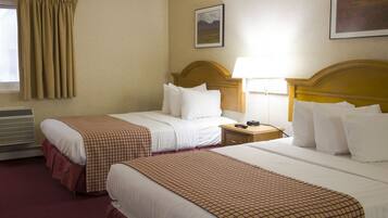 Desk, blackout drapes, iron/ironing board, rollaway beds