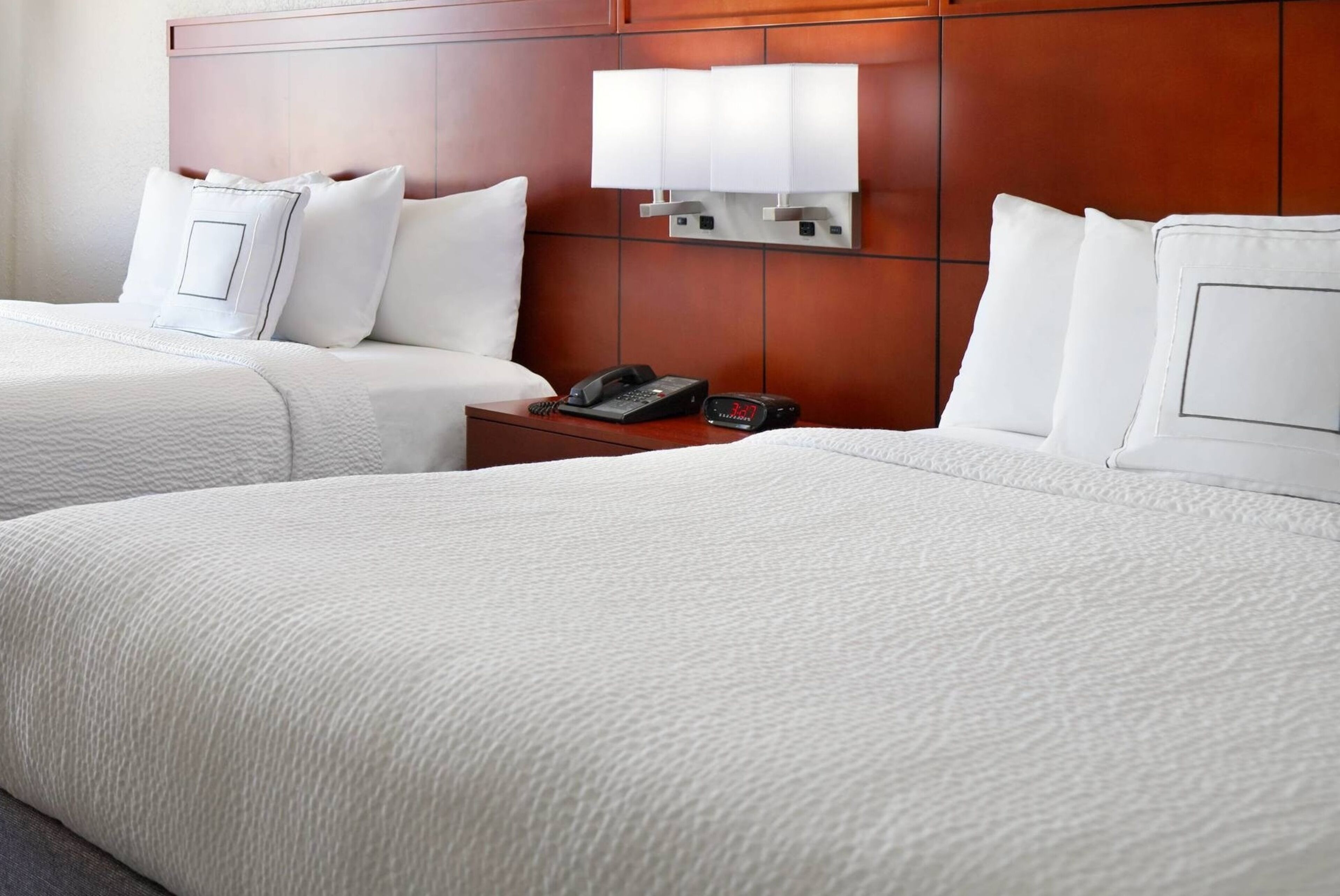 hypo-allergenic bedding, desk, laptop workspace, blackout curtains