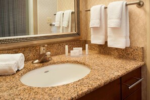 Separate bathtub and shower, hair dryer, towels