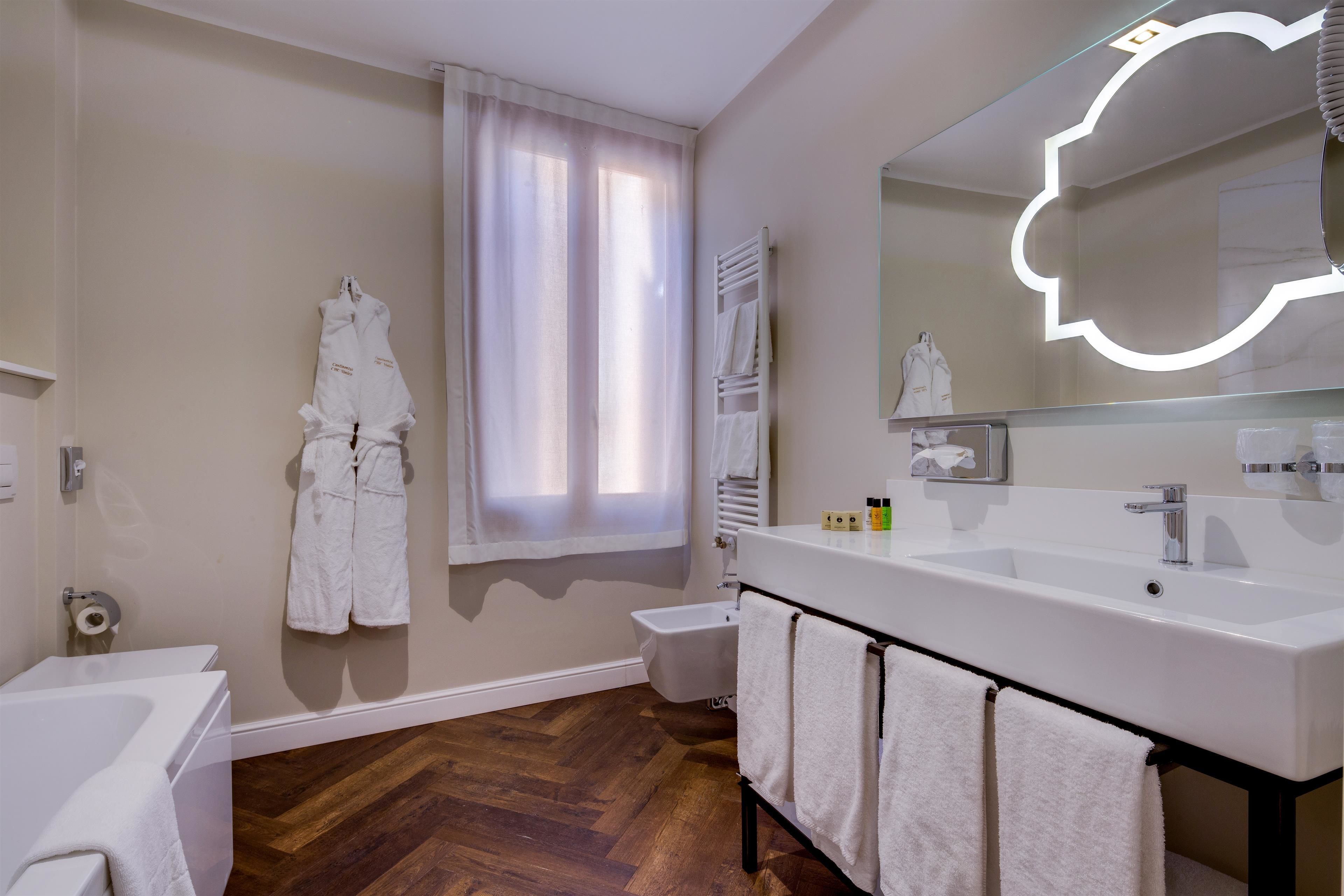 free toiletries, hair dryer, bidet, towels