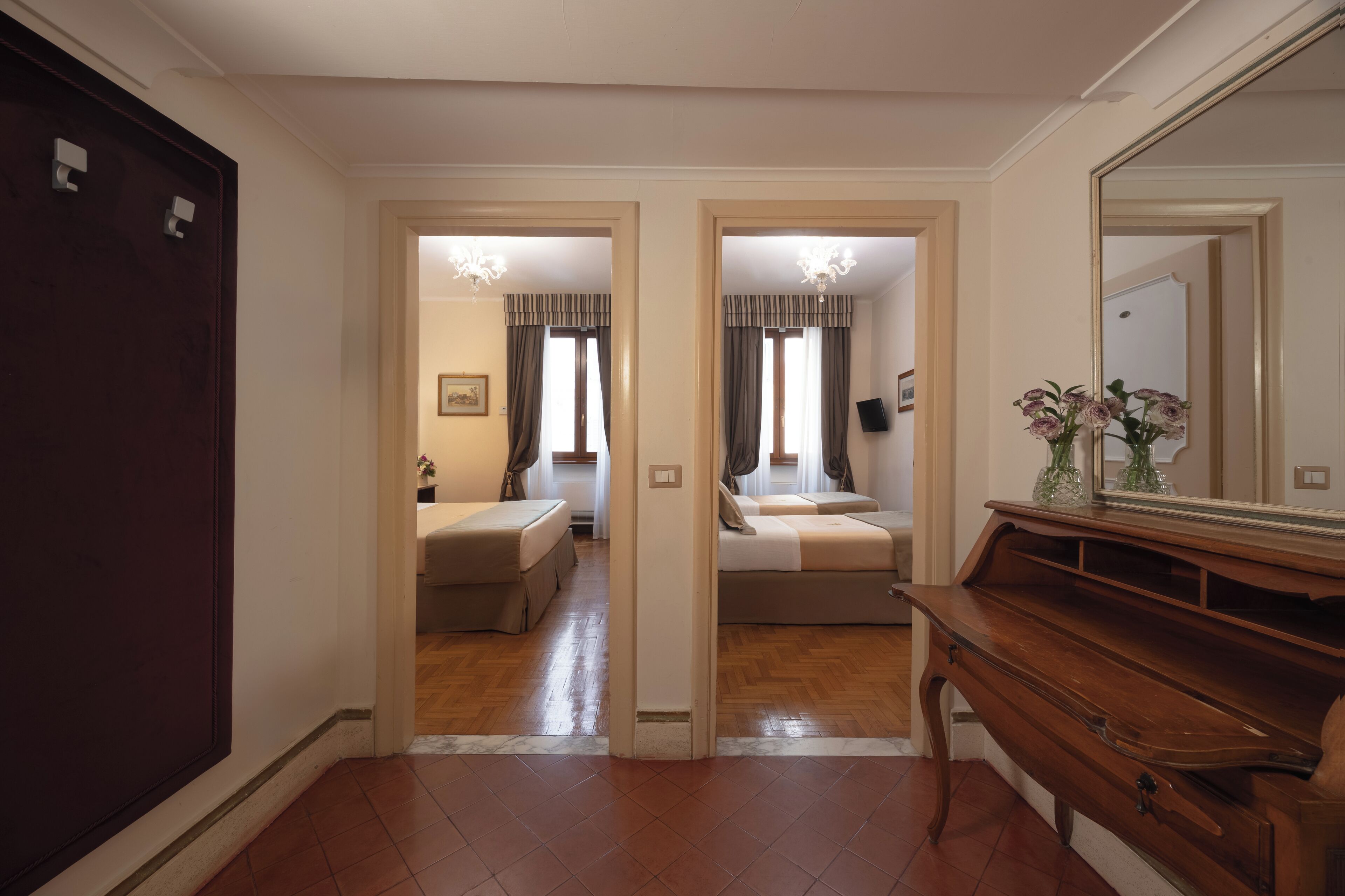 family room | 1 bedroom, minibar, in-room safe, desk