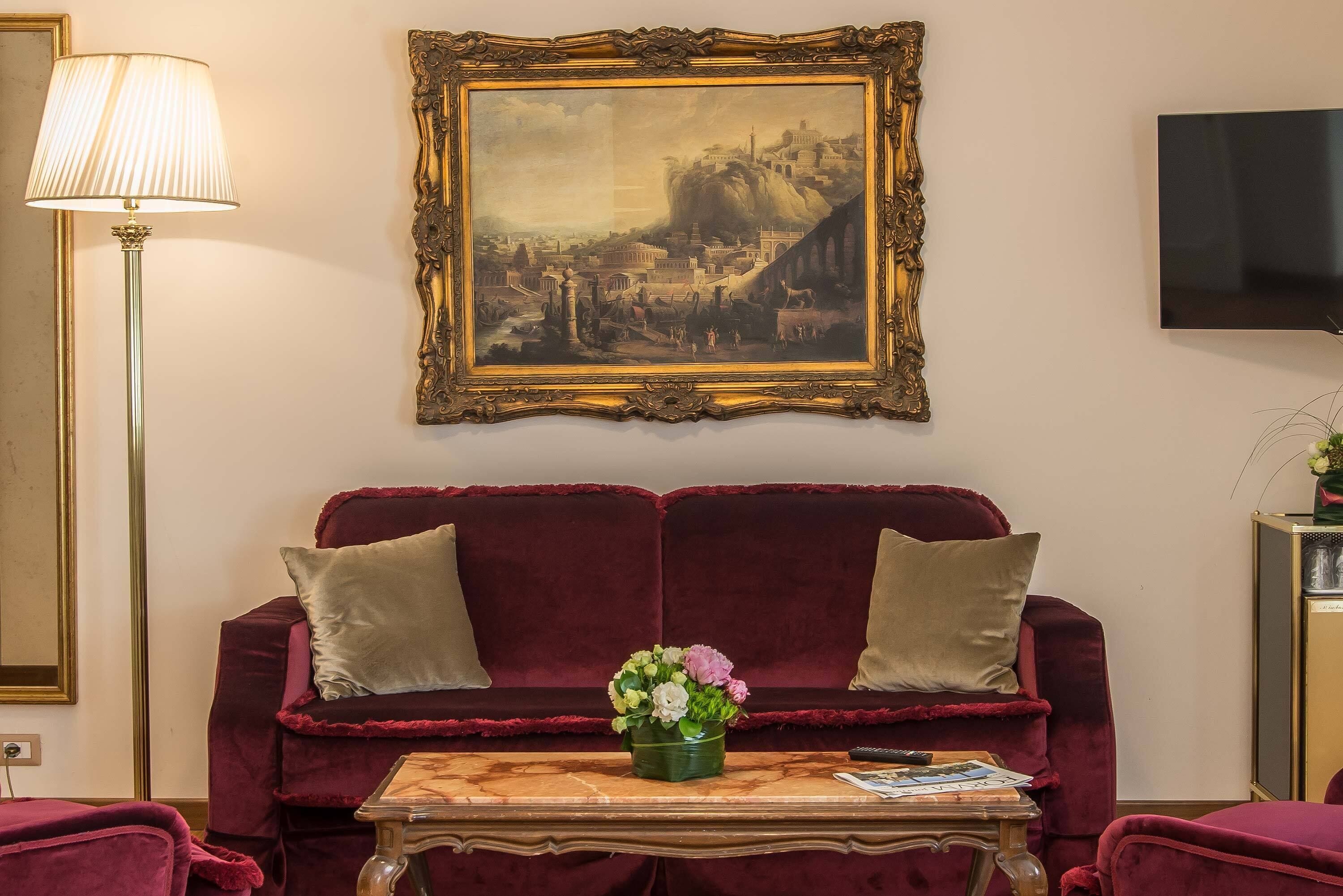 junior suite | living area | flat-screen tv