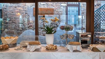 Daily buffet breakfast (EUR 18 per person)