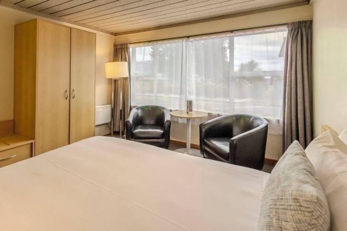 1 bedroom, desk, blackout curtains, iron/ironing board