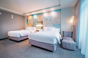 Suite, varias camas | Escritorio, tabla de planchar con plancha, cunas (de pago)