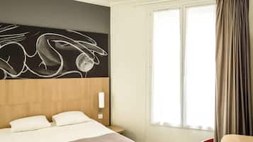 Een kluis op de kamer, een bureau, geluiddichte muren, gratis wifi