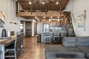 3-BD Lake View Condo W/ Loft - Penthouse Suite - 1210 | Living area | 30-inch Smart TV with cable channels, TV