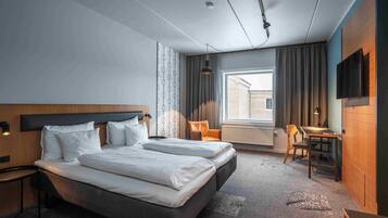 Hypo-allergenic bedding, desk, blackout curtains, iron/ironing board