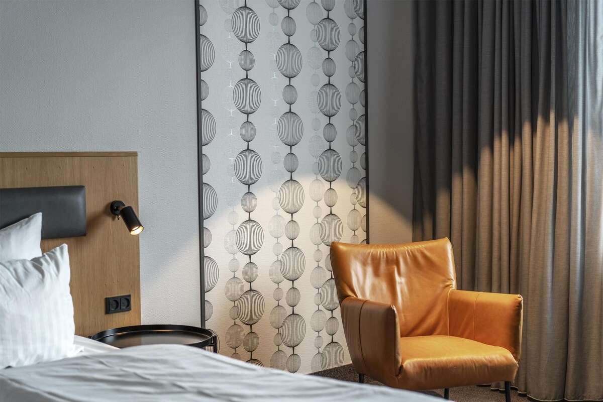 Hypoallergeen beddengoed, een bureau, verduisterende gordijnen