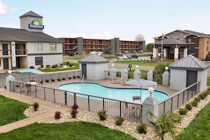 Seasonal outdoor pool, pool loungers