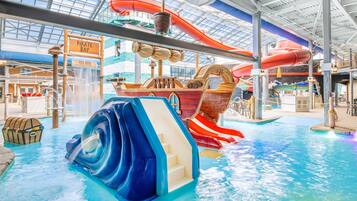 Experience the thrill of Pirate Bay's water slides and play structures.